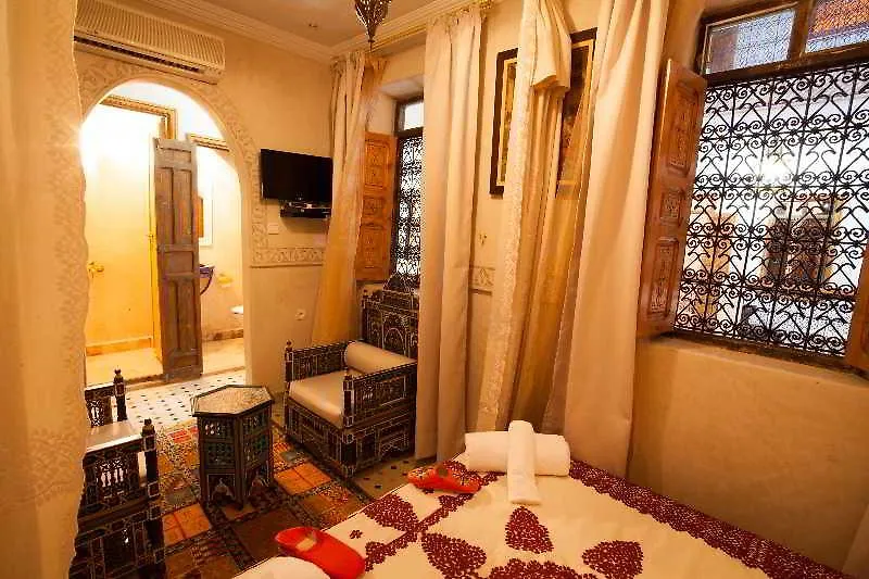 Отель Dar Ikalimo Marrakech Марракеш Риад